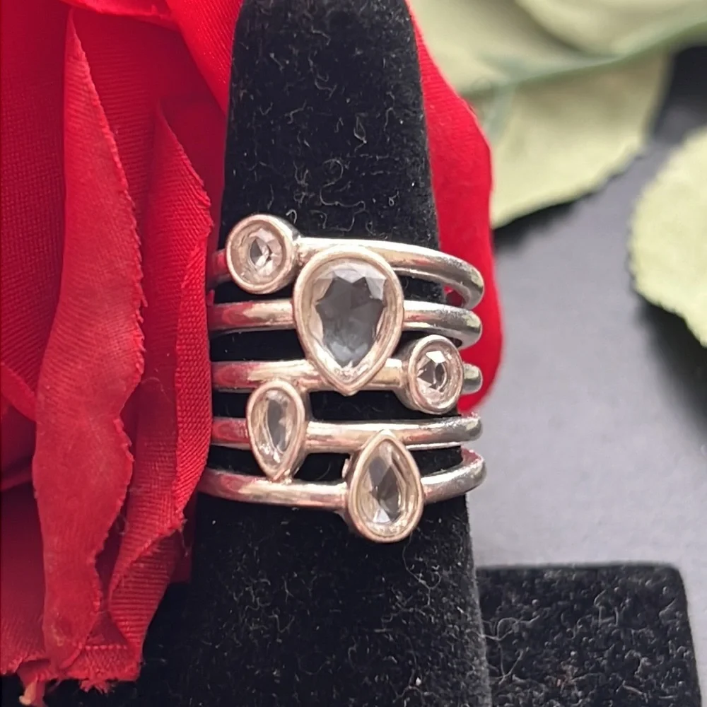 Pretty Silver Tone Multi Band Ring With Different Shape Clear Stones.